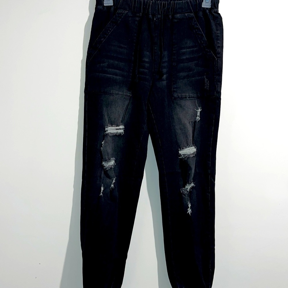Faded black distressed elastic waist jeans. Size 6. NWOT.